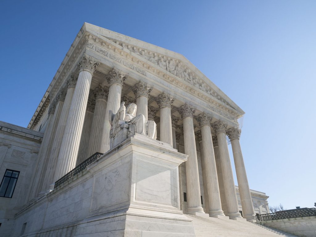 Picture of United States Supreme Court Building Facade in Washington DC.