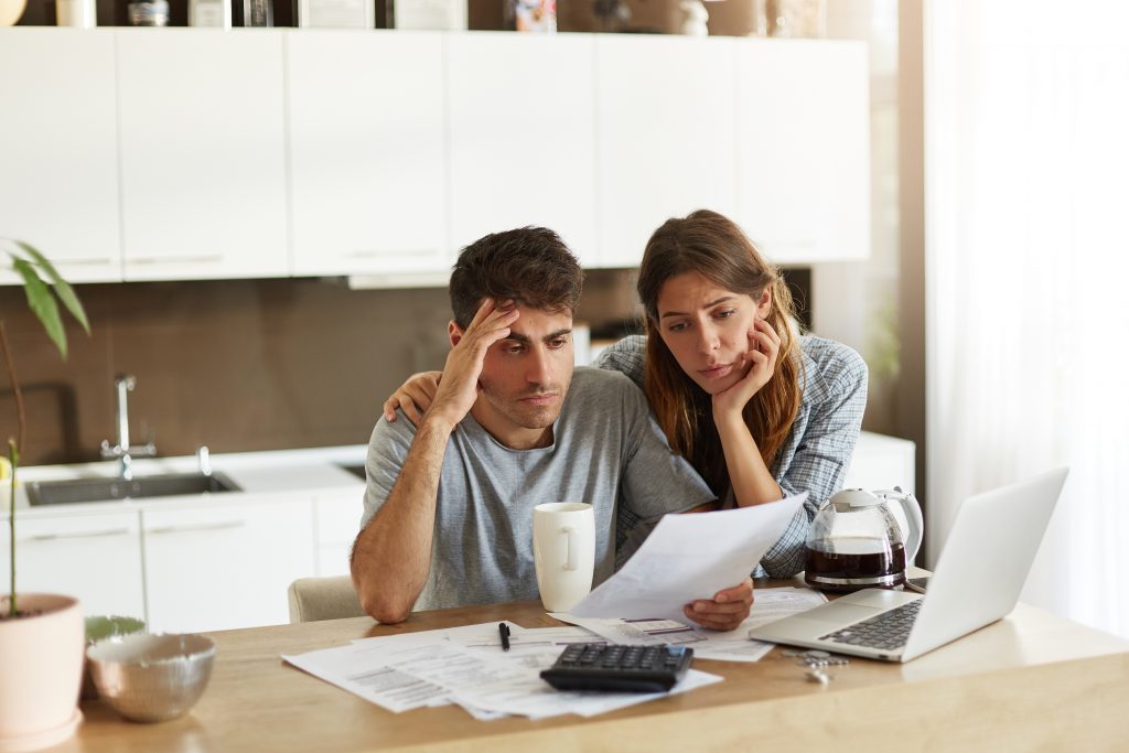 Picture of a couple reviewing paperwork